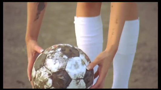 Video 2: muddy soccer girls, white kit vs black kit team